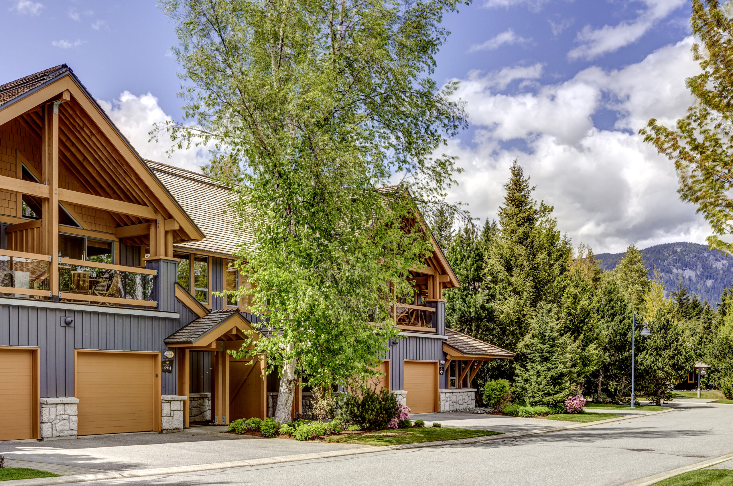 Montebello townhomes with garages on a summer day