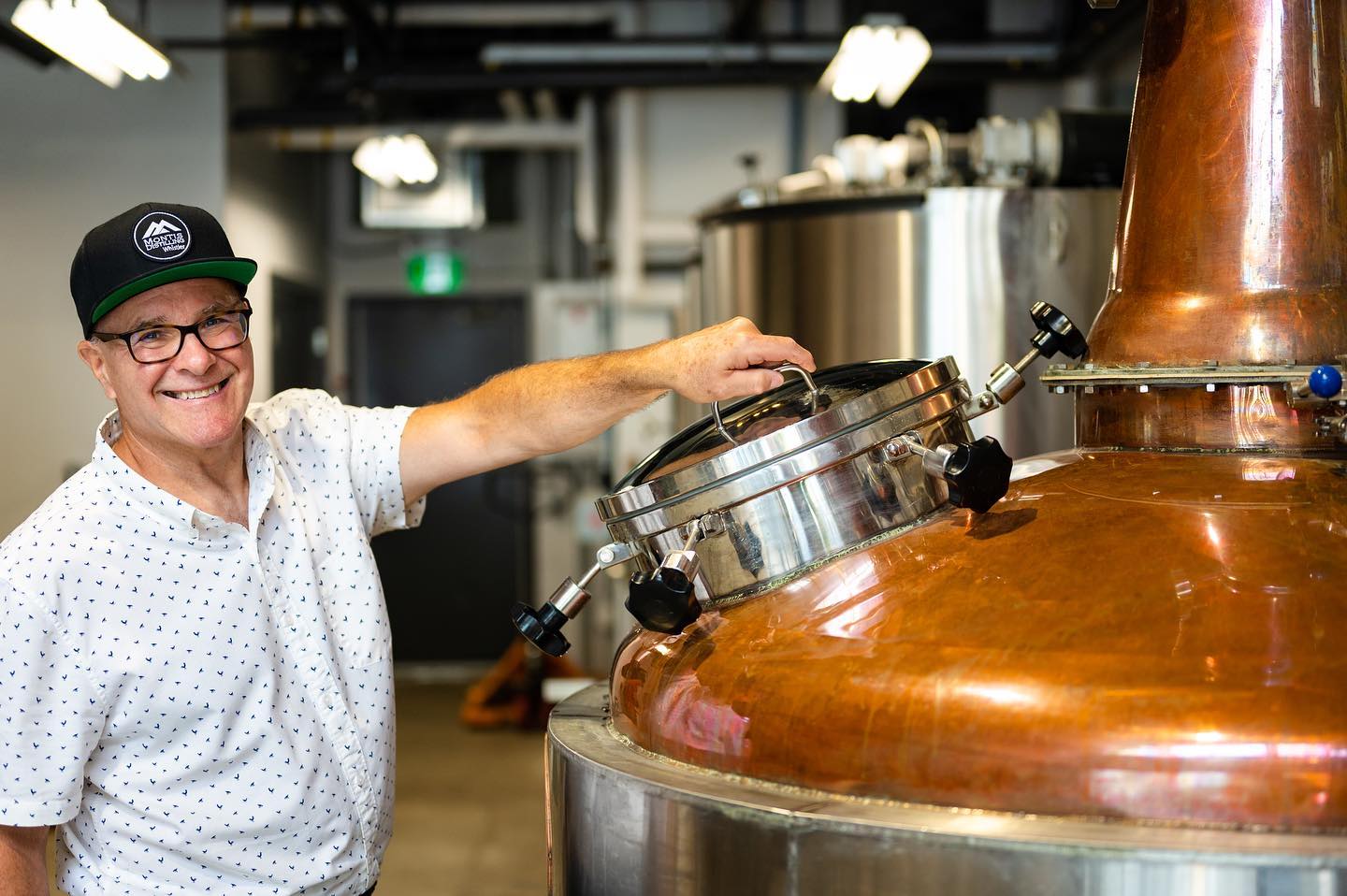 Copper stills and tasting glasses at Montis Distilling in Whistler's Function Junction