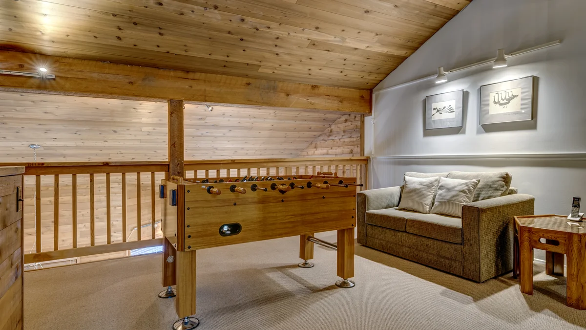 Loft With Foosball Table & Queen Bed