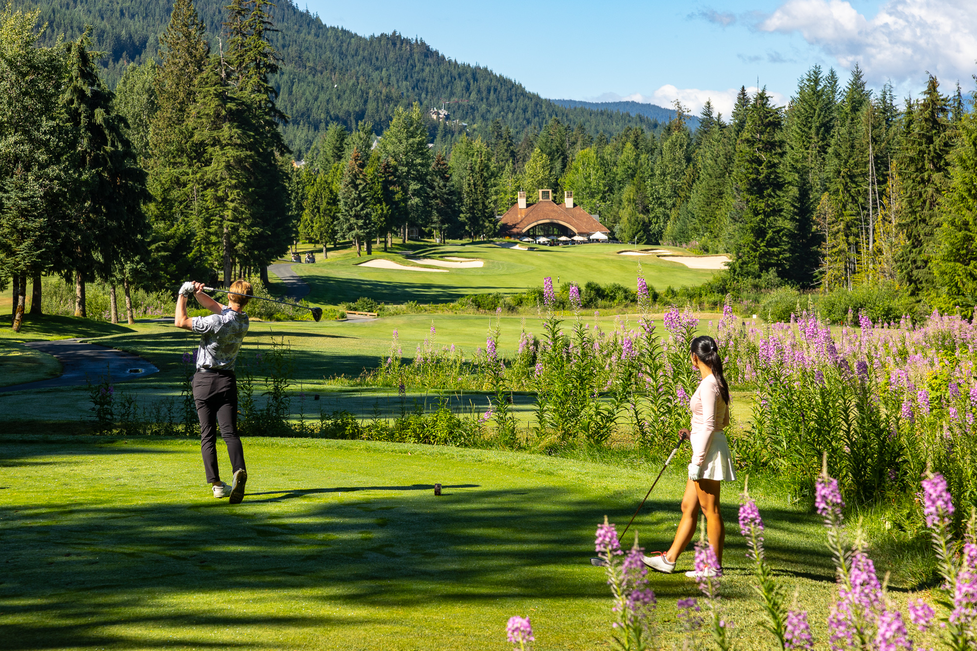 Golfers on the Fairmont Chateau Whistler Golf Club course