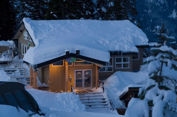 Raven's restaurant under deep snow at the top of the Creekside Gondola