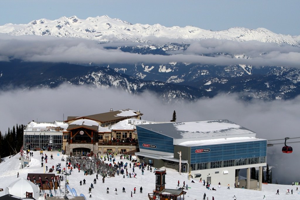 The Roundhouse Lodge at the top of the Whistler Village Gondola, above a layer of cloud